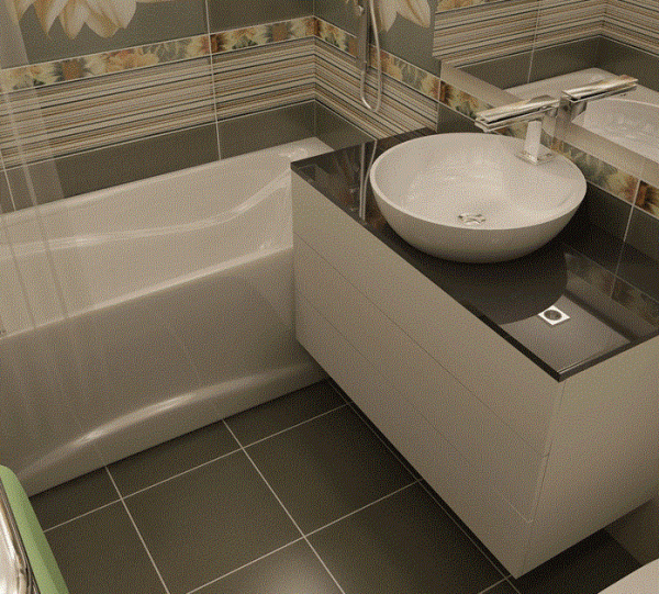 Для невеликої ванної кімнати краще вибирати велику плитку нейтральних відтінків: бежеву, коричневу сіру, з імітацією дерева, однотонну або ненав'язливим малюнком / мозаїкою